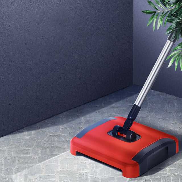 Manual sweeper for rugs and floors