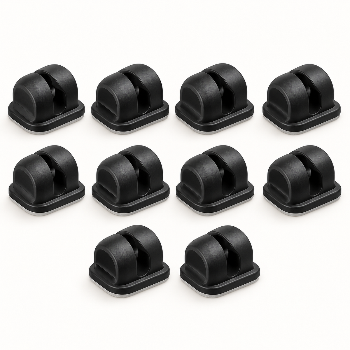 Ilustración conceptual generada con IA de Organizadores adhesivos negros para cables; NO corresponde a una foto de la variante real del proveedor.